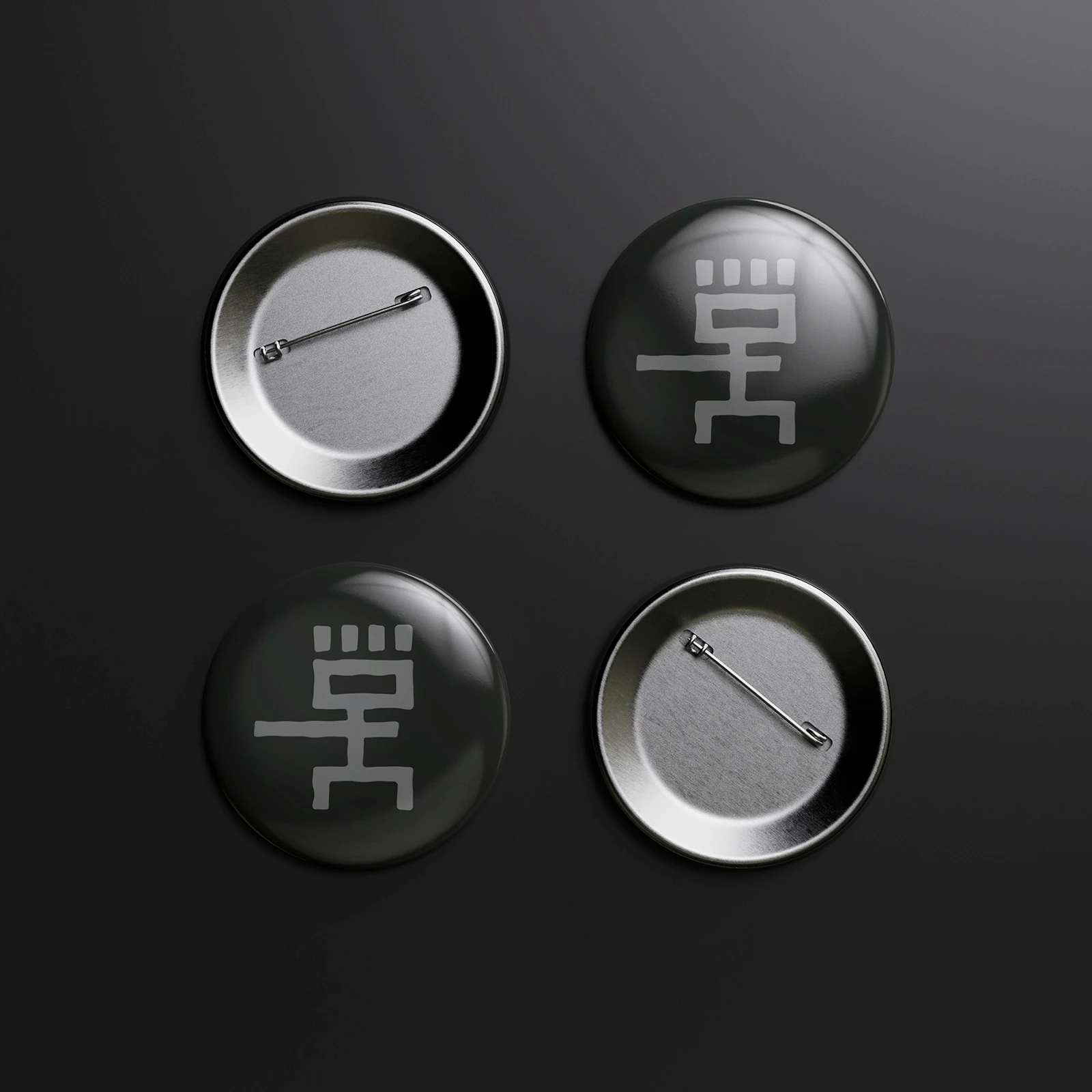 Pins con la identidad Chónek